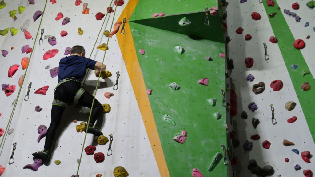 A man climbing a wall.